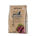 Front view of a 1.5kg bag of Fitmin Cat Purity Delicious cat food. The packaging features a natural brown paper-style graphic with a navy blue "DELICIOUS" label and a blue cat silhouette. At the bottom, there is a silhouette of a stag and an illustration of fresh game meat, blueberries, and rosemary.