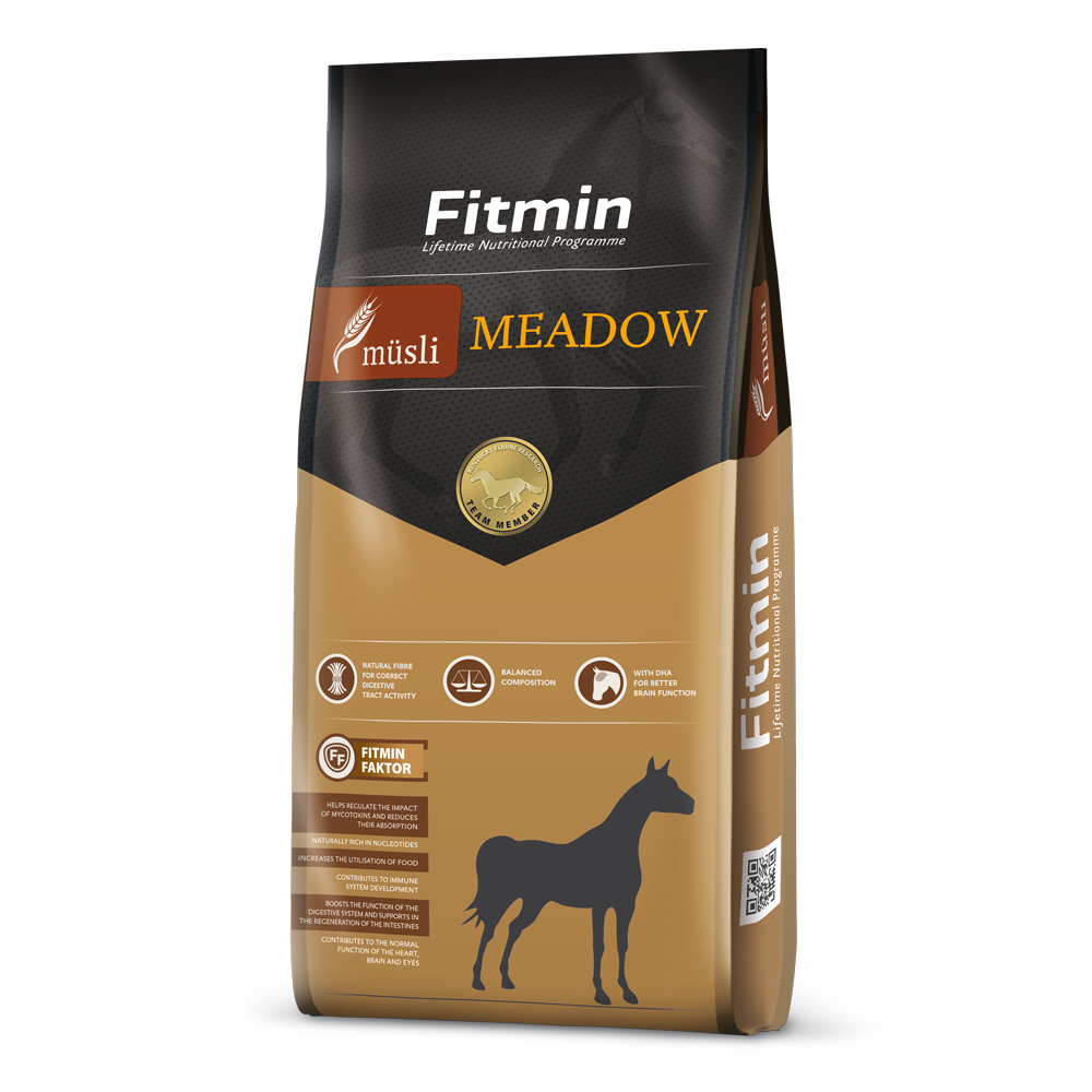 Packaging for Fitmin Horse Muesli Meadow, featuring a tan and dark grey design. The label highlights a balanced composition with natural fibre for digestive tract activity and DHA for brain function, presented as a high-quality muesli with essential minerals and the Fitmin Faktor.