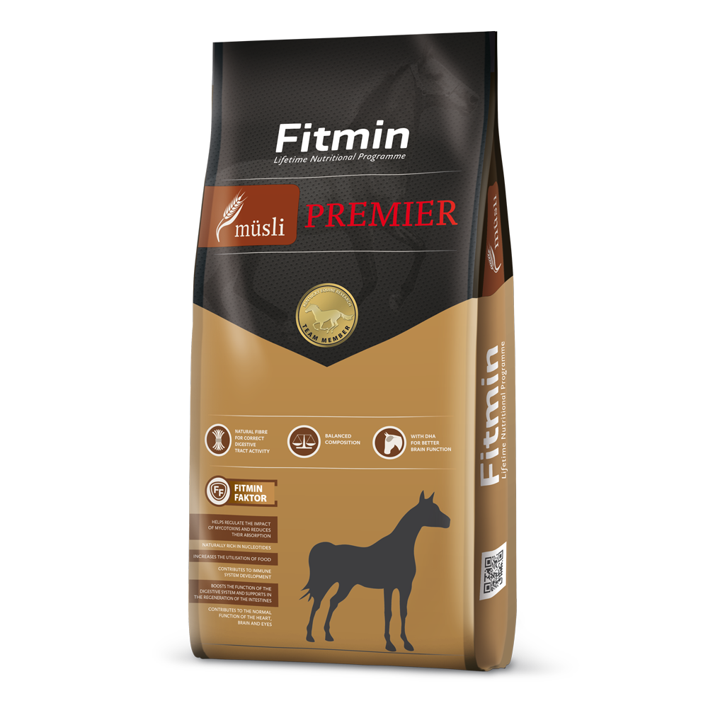 Packaging for Fitmin Horse Muesli Premier, featuring a tan and dark grey design with red accents. The label highlights a balanced composition with natural fibre for digestive health and DHA for better brain function, designed as a premium supplementary muesli for high-performance horses.